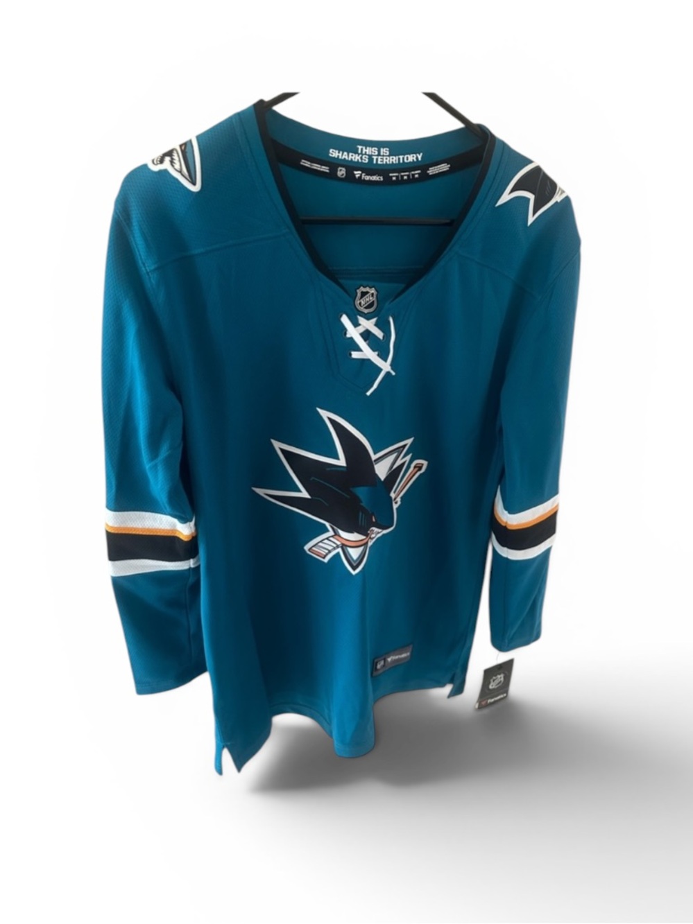 Brand new- never worn women’s Sharks jersey